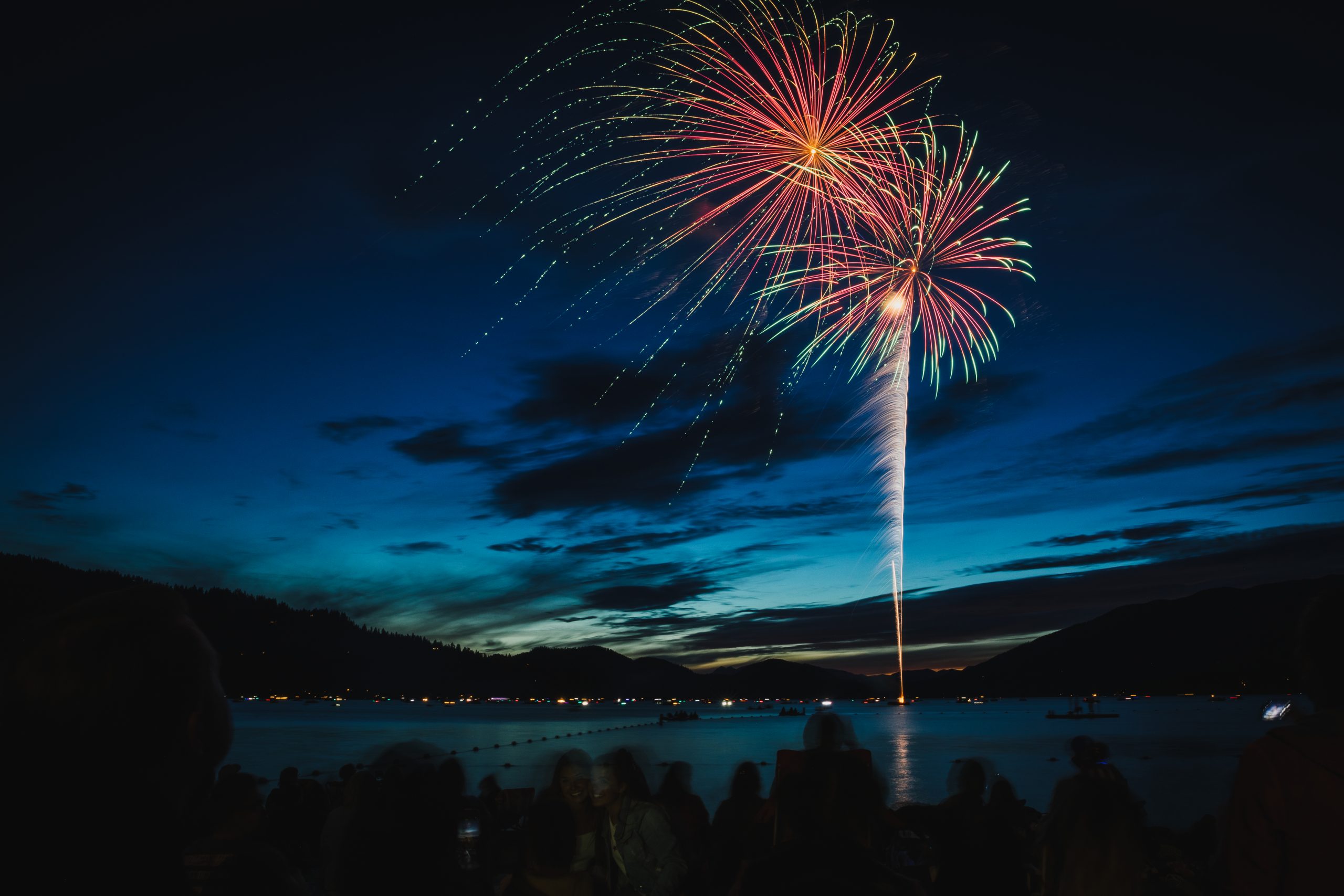 Fireworks explode in the sky above Whitefish Lake during the 4th of July celebrations in Whitefish, Montana.