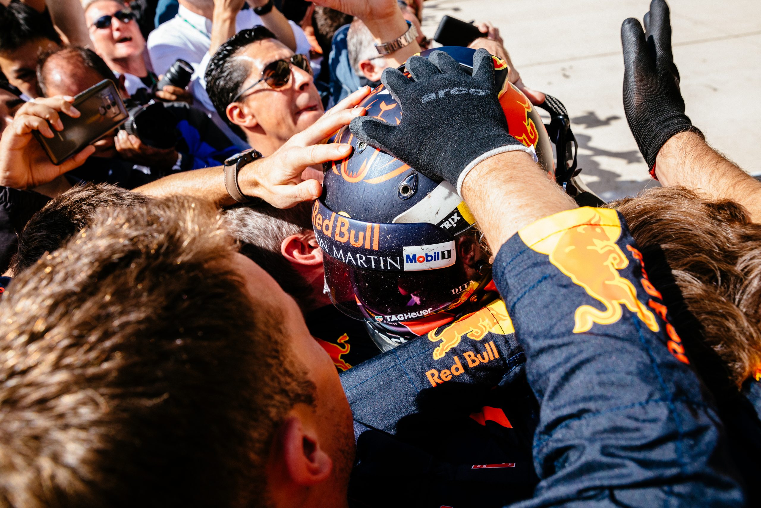 Max Verstappen celebrates with his team after a stellar drive from 18th to 2nd, something extremely rare in Formula 1.